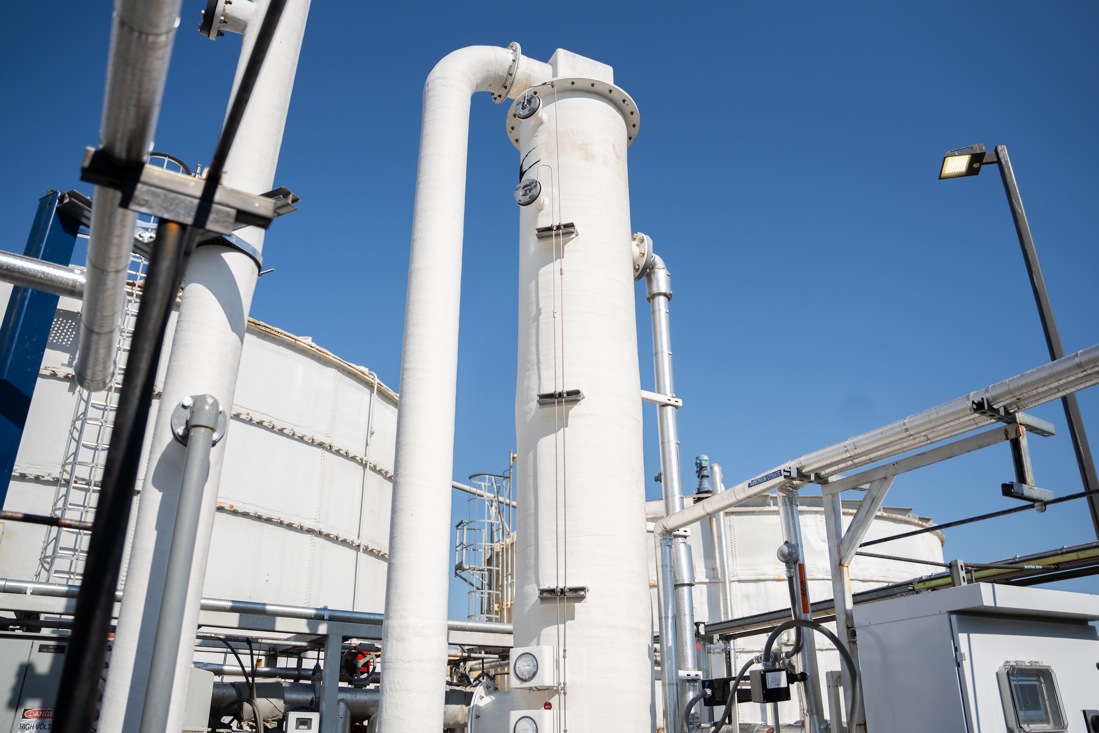 Large white cylindrical column with pipes attached at the READ facility